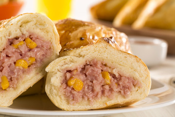 Brazilian snack fried with cheese ham on wooden background.