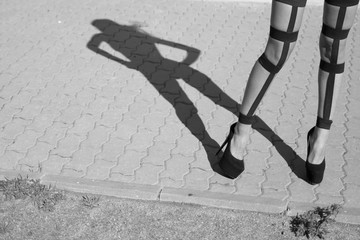 shadow girl and feet in frame, photo black white