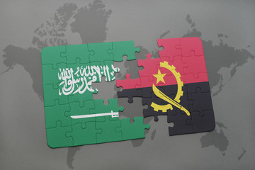 puzzle with the national flag of saudi arabia and angola on a world map background.