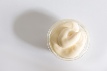top view on mayonnaise, on a white background with shadow