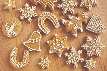 Homemade christmas cookies on wooden table. Toned