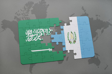 puzzle with the national flag of saudi arabia and guatemala on a world map background.