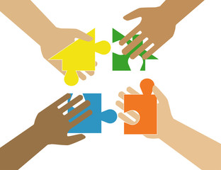 Four hands putting multicolor puzzle pieces together. Teamwork, cooperation, business, solution, work concept.