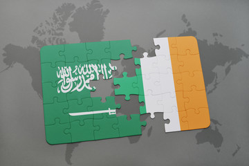 puzzle with the national flag of saudi arabia and ireland on a world map background.