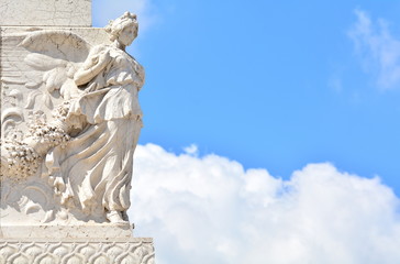 The angel in the blue sky. on the National Monument in Rome,Italy - 119079593