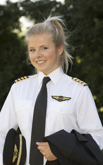 Portrait of a young female pilot in uniform © petert2