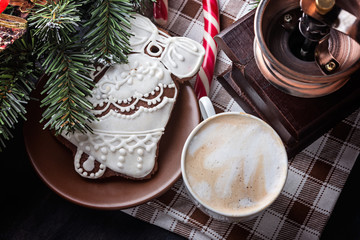 Christmas homemade gingerbread cookies on wooden background