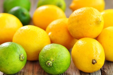 Organic lemons on a wooden background. Vintage style.