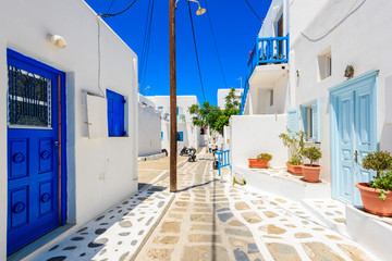 Typical narrow street with white house in Mykonos town, Mykonos island, Greece