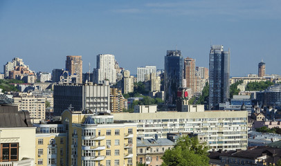 Fototapeta na wymiar Kiev cityscape: view of Rusanovka district with water