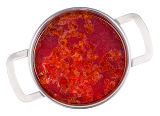Hot borsch in a steel pan isolated