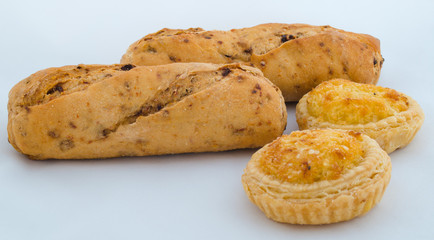 Isolated assortment of bread .