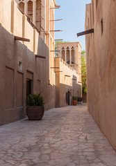 Fototapeta na wymiar Narrow deserted street in the old city of Dubai UAE