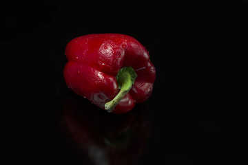 Red sweet pepper languid from time