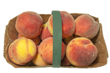 Basket full with sweet juicy fresh Peaches