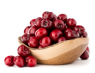 cherry berries in wooden bowl
