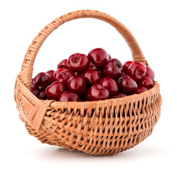 cherry berries in wicker basket isolated on white background cut