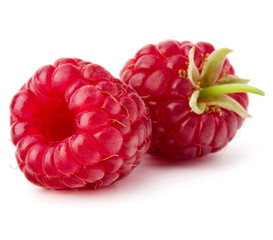 ripe raspberries isolated on white background close up