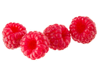 ripe raspberries isolated on white background close up