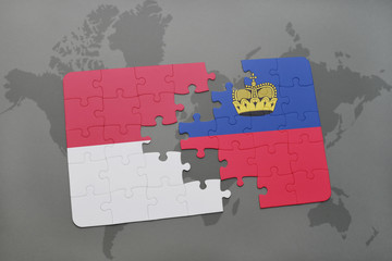 puzzle with the national flag of indonesia and liechtenstein on a world map background.