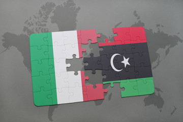 puzzle with the national flag of italy and libya on a world map background.