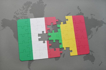 puzzle with the national flag of italy and mali on a world map background.