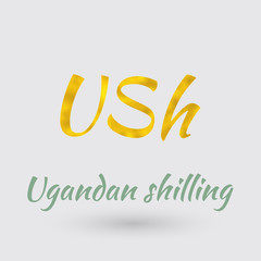 Golden Symbol of the Ugandan Shilling