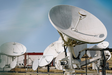 Array of satellite dishes for telecommunications