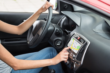Naklejka premium Woman Using GPS Navigation