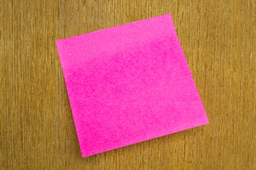 color  stickers on a wooden board from notice