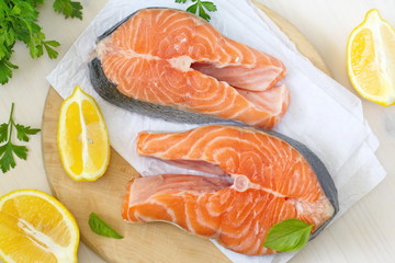 Raw fish with vegetables and lemon prepared for cooking