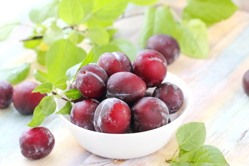 Ripe plums on the table