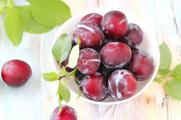 Ripe plums on the table