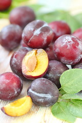 Ripe plums on the table