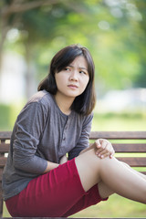 Obraz premium Woman Stomachache at Park