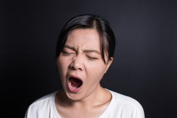 Woman yawning