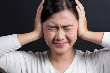 Woman Has Head Ache