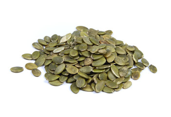 Pumpkin unshelled seeds isolated on white