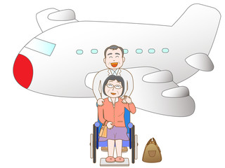 飛行機で旅行するシニア夫婦