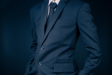 Businessman in Black Suit on Isolated Background