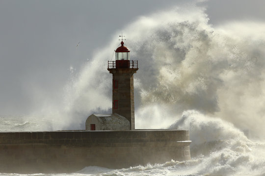 Stormy waves over lighthouse
