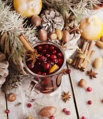 Cup of hot wine Christmas card with fir-tree branches