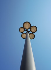  Street Lamps on Iron Post Against a Blue Sky © snowyns