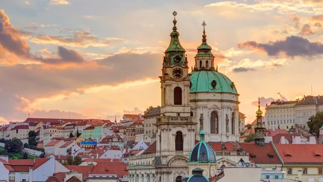 sunset behind St Nicolas timelapse in Mala Strana in Prague