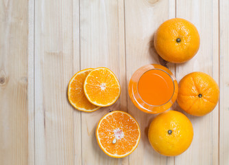 Fresh orange and orange juice in glass