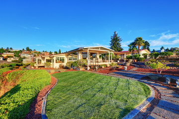 Luxury house exterior at sunset.