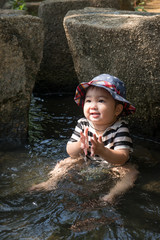 Baby playing in the water