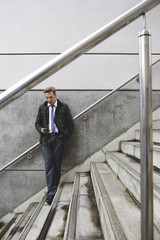 Businessman on Stairs