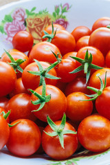 Group of red organic fresh cherry tomatoes