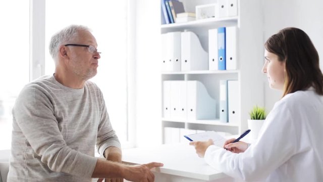 senior man and doctor meeting at hospital 43